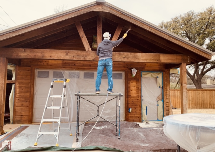 Top Coat Painting team working on a residential project